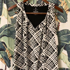 New York & Co. Flowy tie front blouse with cotton back. Size XS